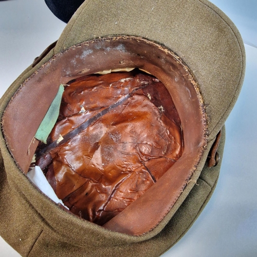 19 - Two WWI period Officer's caps with cap badges for Royal Artillery. (2) (Mannequin head for display o... 