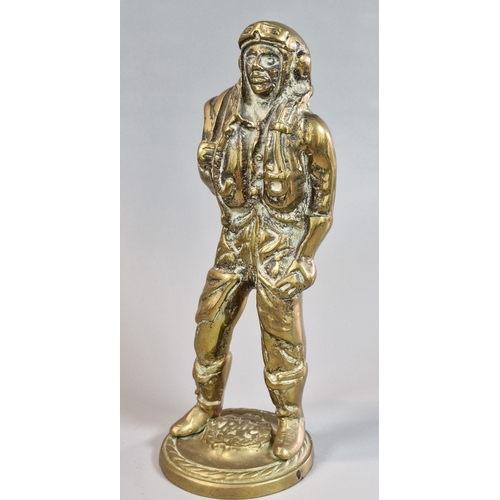 2 - Cast brass figure of an RAF Battle of Britain Fighter Pilot, with RAF crest to the circular gadroon ... 