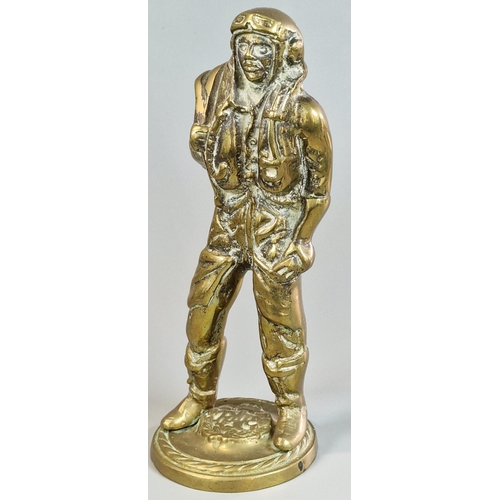 2 - Cast brass figure of an RAF Battle of Britain Fighter Pilot, with RAF crest to the circular gadroon ... 