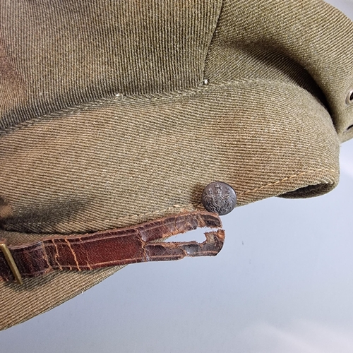 20 - Two WWI Officer's caps, one with badge for Queen's Own Yeomanry, the other cap badge bearing initial... 