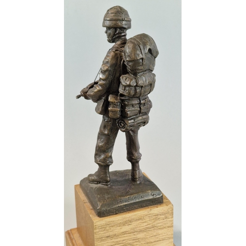 23 - After Brian Elton, bronzed full length figure of a British Army Paratrooper in full battle dress wit... 