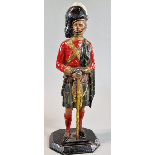 26 - Cold painted spelter full length figure of a Scottish Army Officer in dress uniform. Octagonal base.... 