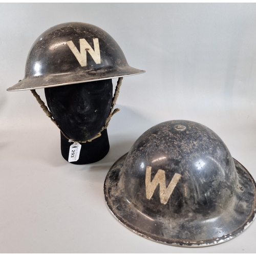 293 - Two WWII British Civil Defence Warden Brodie helmets with liners and chinstraps. Both marked 'BMB'. ... 