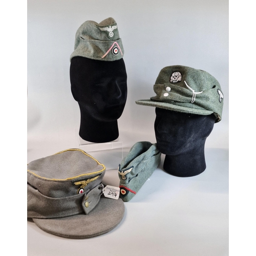 297 - Two WWII German army (Heer) M34 overseas caps. Together with two reproduction M43 field caps. (4) (B... 