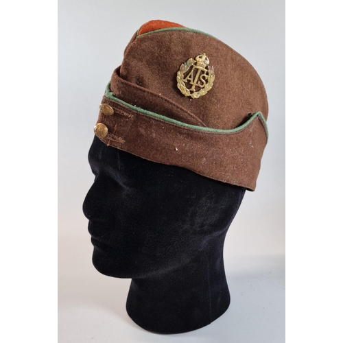 30 - Probably WWII period ATS fore and aft forage cap with ATS badge and crested buttons. (B.P. 21% + VAT... 