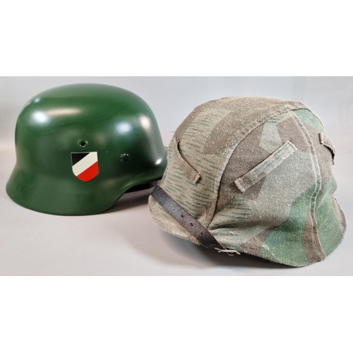 322 - Two modern German helmets. One with Splinter tarn helmet cover. And another vibrant Dark Moss Green ... 