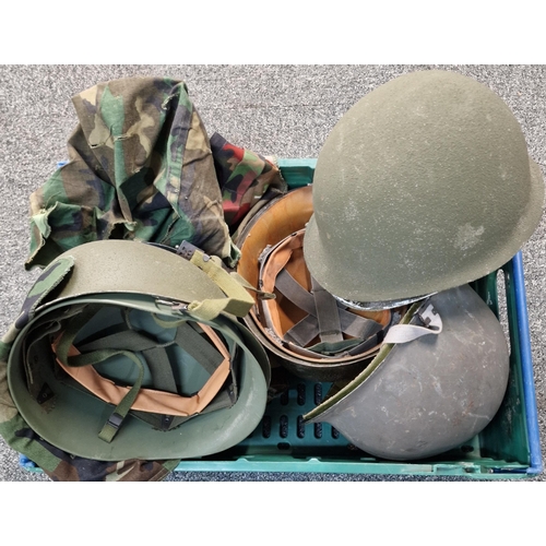 326 - Box containing five post WWII American/U.S. M1 helmets. Together with four helmet camouflage covers.... 