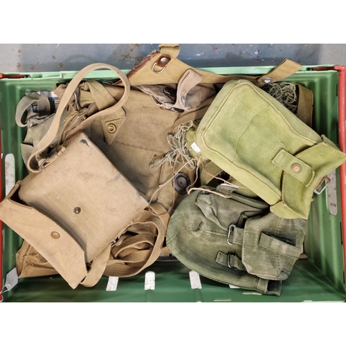 337 - Two boxes containing British Army camouflage shirts, satchels, gas mask bags, binocular cases. Some ... 