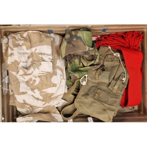 337 - Two boxes containing British Army camouflage shirts, satchels, gas mask bags, binocular cases. Some ... 