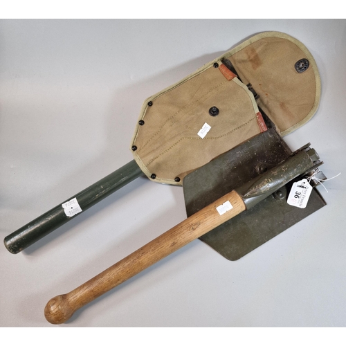 36 - Two entrenching tools, one dated 1965, both with wooden handles, one with canvas cover. (B.P. 21% + ... 