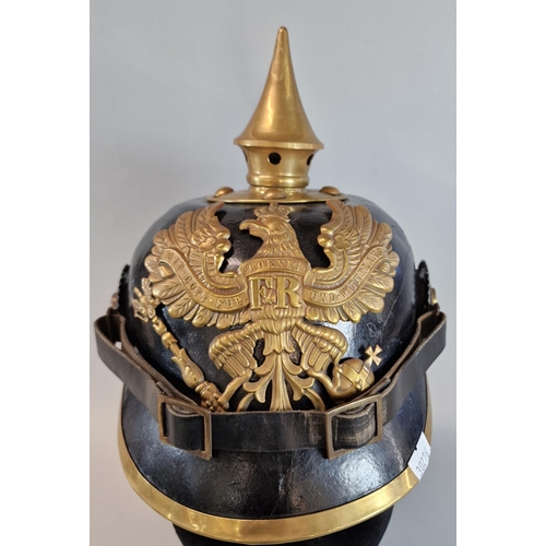 59 - Imperial German leather and brass Pickelhaube Officer's helmet with brass Imperial Eagle motif. Inte... 