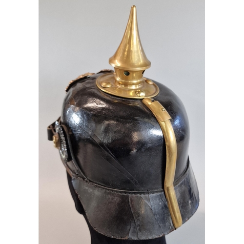 59 - Imperial German leather and brass Pickelhaube Officer's helmet with brass Imperial Eagle motif. Inte... 