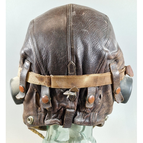 6 - British leather flying helmet with oxygen mask marked 'AM, 10A 12570' and a pair of British classic ... 