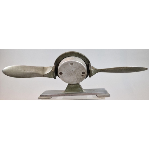 8 - British made white metal desk top barometer in the form of a propeller, on rectangular stand. 29.5cm... 