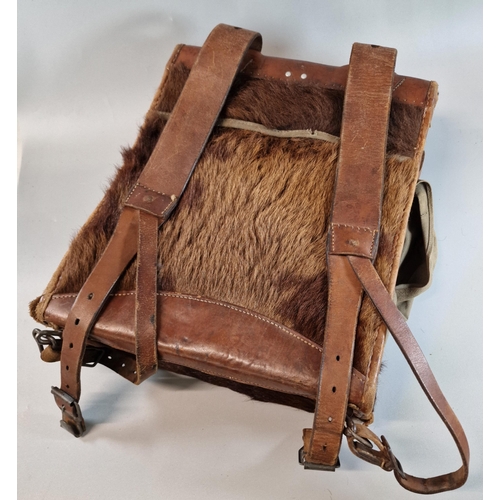 80 - German WWII Wehmacht Nachricht Tornisterin leather rucksack, with fur outers and canvas lining, fitt... 