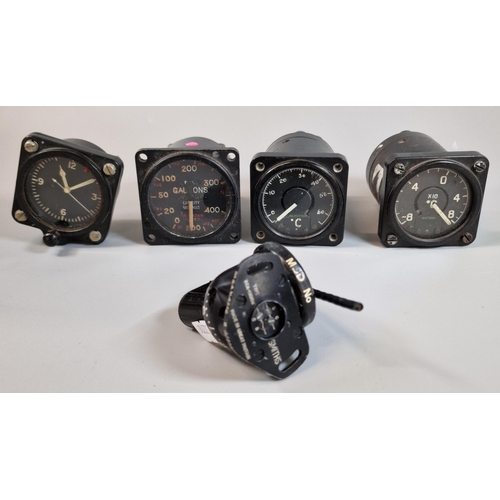 9 - Collection of British military aircraft gauges to include: temperature, a clock, fuel etc. Each 8cm ... 