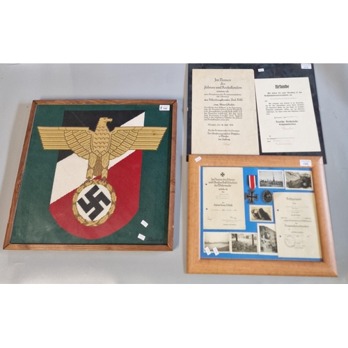 149 - Framed tapestry of a Third Reich Eagle insignia. 48x52cm approx. Together with framed montage of WWI... 