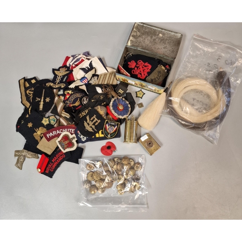 158 - Box of assorted Military fabric insignia, horse hair plumes, some Military buttons etc. (B.P. 21% + ... 