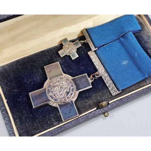 205 - German WWI period Blue Max Medallion with throat ribbon (copy), together with a George Cross 'For Ga... 