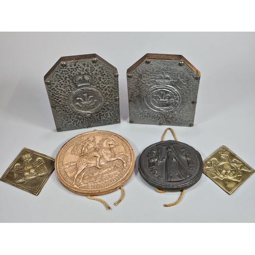 137 - Two replica Royal seals, two reproduction brass miliary armorials, possibly from Shako plates and a ... 