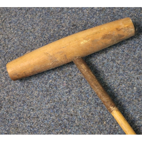 143 - A vintage wooden polo stick. (B.P. 21% + VAT)