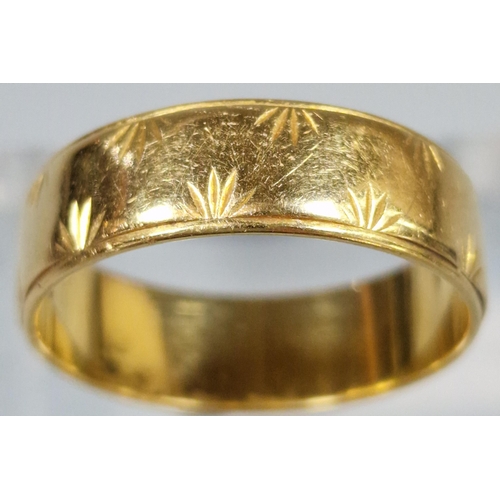 183 - 18ct gold engraved wedding band. 4.2g approx. Ring size O 1/2. (B.P. 21% + VAT)