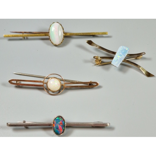 217 - A collection of opal bar brooches. (4) (B.P. 21% + VAT)