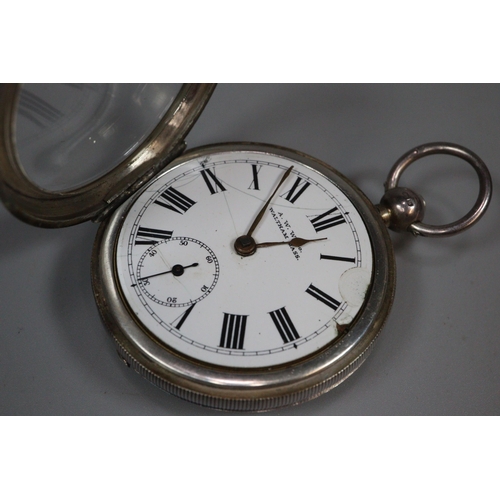 228 - Silver open-faced pocket watch by Waltham on a silver Albert chain with key. Together with another s... 