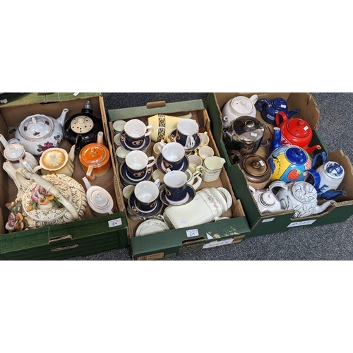 319 - Three boxes of ceramics to include: novelty and other teapots, various tea ware, some marked 'Burber... 