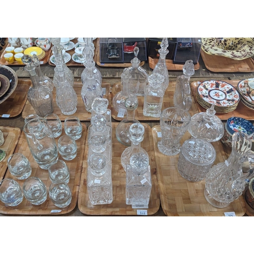 325 - Five trays of assorted glassware to include a variety of decanters and stoppers, lemonade set, jug, ... 