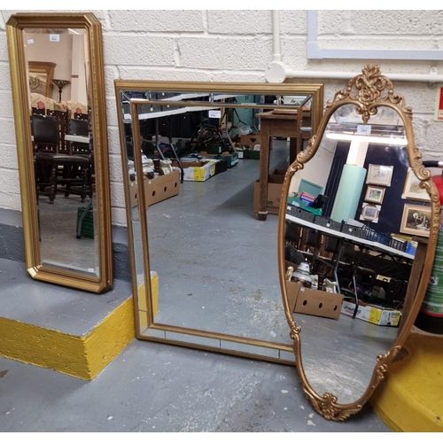 394 - Three modern gilt framed mirrors, one with foliate designs. (3) (B.P. 21% + VAT)