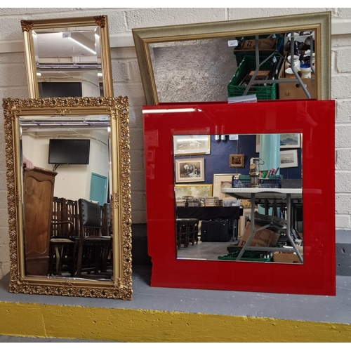 395 - Collection of four modern mirrors, one with red contemporary frame. (4) (B.P. 21% + VAT)