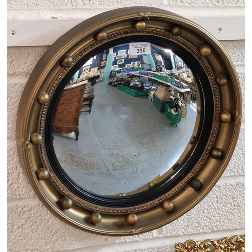 396 - Gilt frame circular convex mirror. (B.P. 21% + VAT)