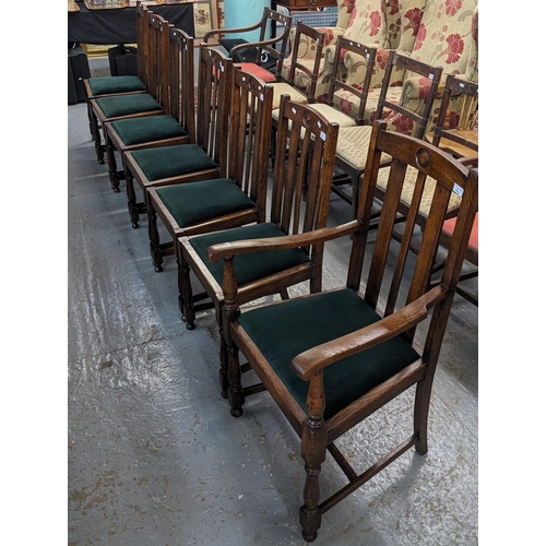 414 - Set of seven oak slat back dining chairs with drop-in seats. (6+1) (7) (B.P. 21% + VAT)