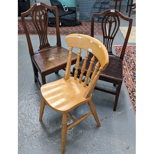 423 - Pair of early 19th century oak camel-back farmhouse kitchen chairs together with a modern beech spin... 