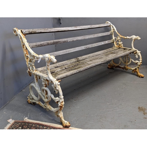 454 - Cast iron garden bench with hounds head terminals and snake designs, having wooden slats. Probably 1... 