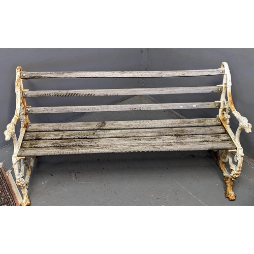 454 - Cast iron garden bench with hounds head terminals and snake designs, having wooden slats. Probably 1... 