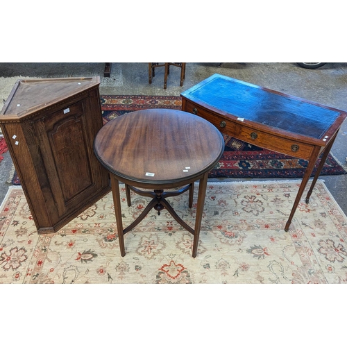 457 - Edwardian inlaid mahogany bow fronted writing table with inset leather surface, two frieze drawers o... 