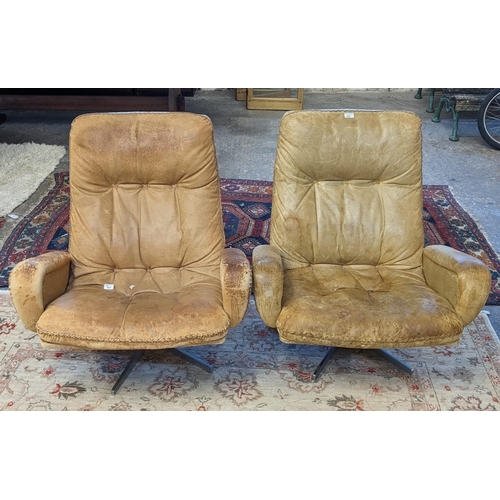 464 - Pair of 1960's or 70's leather designer pedestal, 'James Bond' chairs, probably by De Sede. (Sold as... 