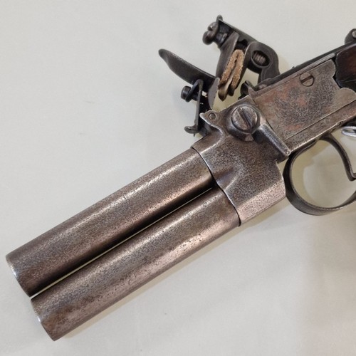 102 - 18th century over and under tap action flint lock overcoat pistol, maker's name obscured, possibly I... 