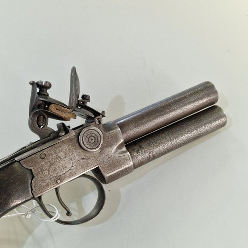 102 - 18th century over and under tap action flint lock overcoat pistol, maker's name obscured, possibly I... 