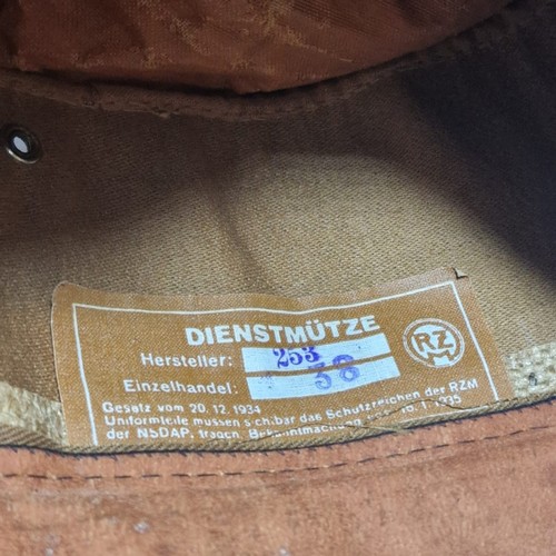 298 - German WWII SA style Kepi with 'Dienstmütze RZ' tag. Together with Waffen SS M43 style Fez with 'Lud... 