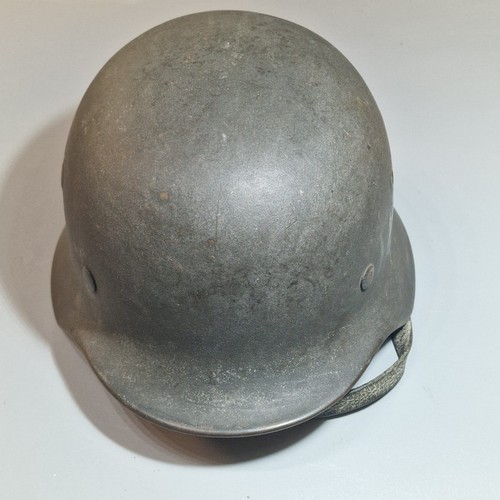 302 - German Third Reich M42 single decal helmet, with leather liner and chinstrap. Unclear markings stamp... 