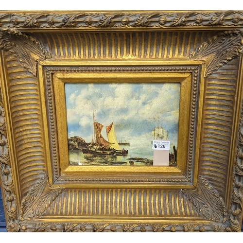 126 - Reproduction study of sailing vessels off a coast-line, in heavy gilt frame. A furnishing picture.  ... 