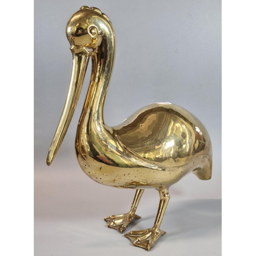 14 - Naturalistic brass study of a Pelican. 32cm high approx.  (B.P. 21% + VAT)