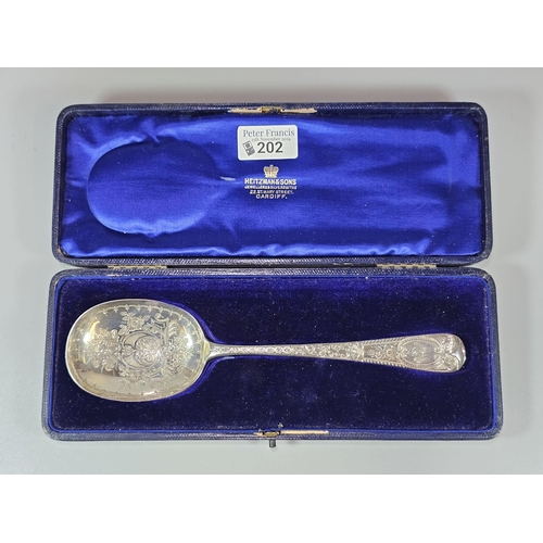 202 - Late Victorian silver floral and foliate engraved spoon in fitted case, by Josiah Williams & Co, Lon... 