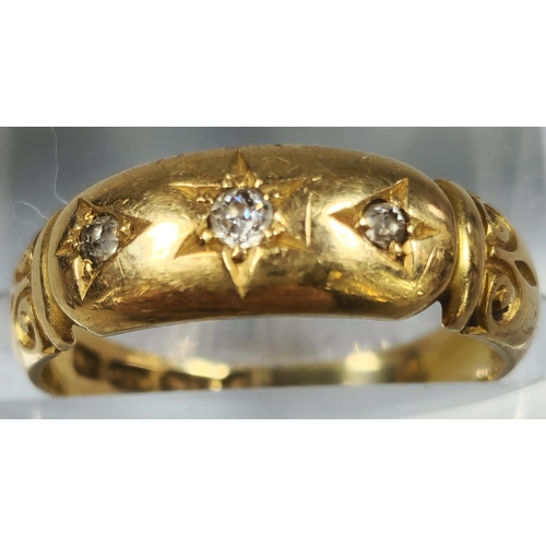 215 - 18ct gold engraved three stone diamond ring. 3g approx. Size M.  (B.P. 21% + VAT)