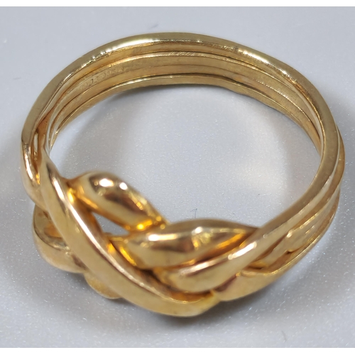 219 - 9ct gold Celtic Knot/Puzzle ring. 4.7g approx. Size S.  (B.P. 21% + VAT)