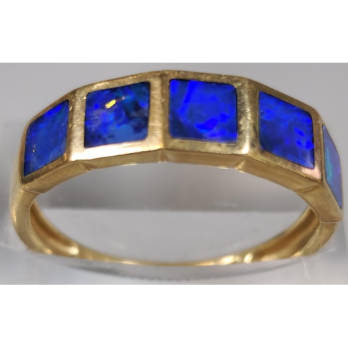 226 - 9ct gold blue five stone dress ring. 2.5g approx. Size P1/2.  (B.P. 21% + VAT)