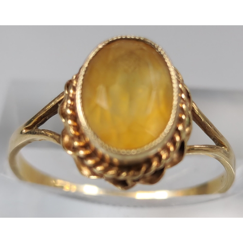 228 - 9ct gold orange stone dress ring. 2g approx. Size P.  (B.P. 21% + VAT)